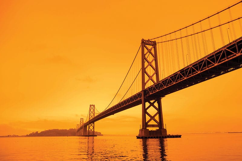 orange skies over the Golden Gate Bridge, as seen from the water below, on September 9, 2020