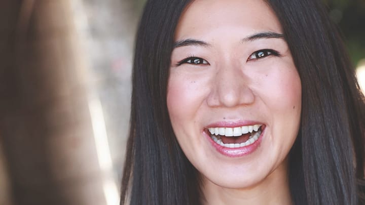 A headshot of Jiehae Park smiling.